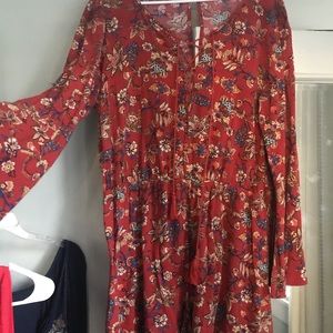 Red printed bell sleeve romper with lace up chest